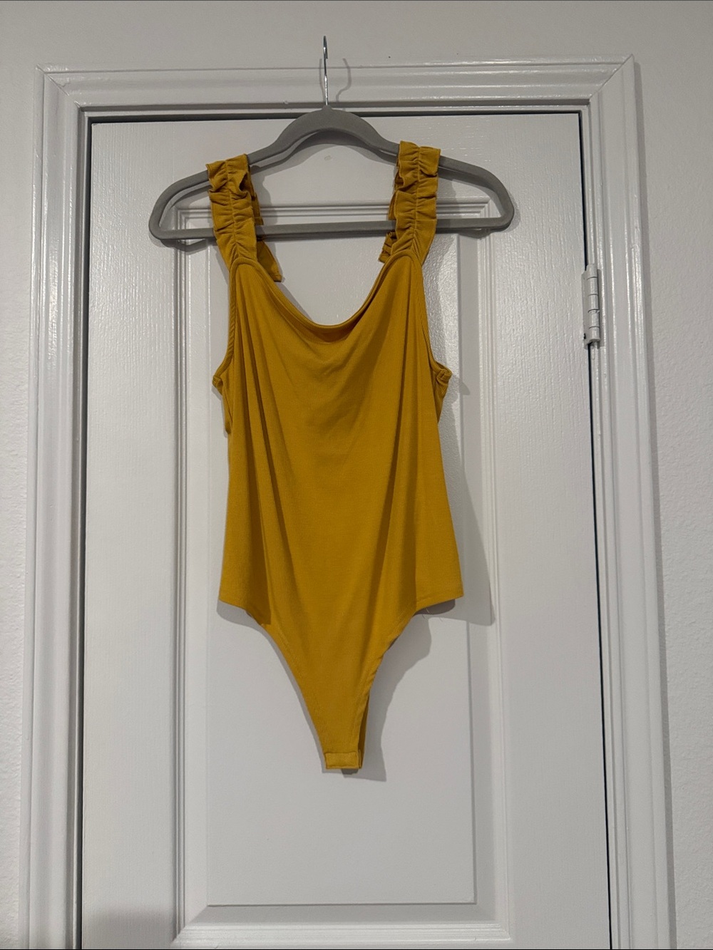 BB Dakota by Steve Madden Mustard Ruffle-Shoulder Bodysuit - Picture 1 of 5